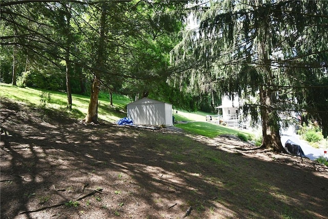 226 Johnston St, Cecil, PA 15057 - view of grassy yard with a storage unit