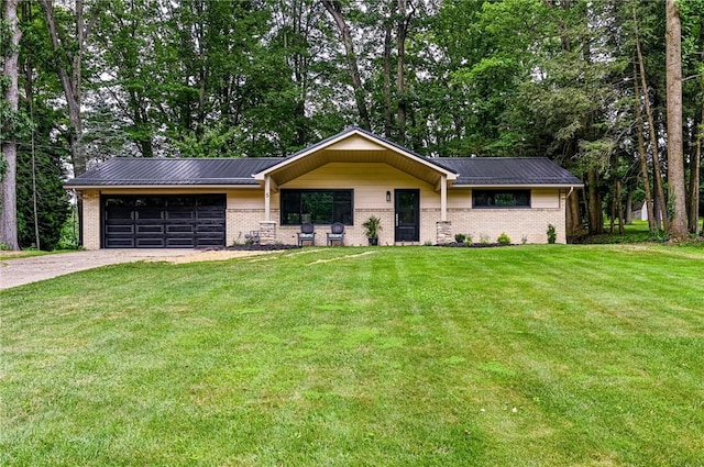 5 Bel Aire Dr, Murrysville, PA 15626 - view of front of property featuring brick siding, concrete driveway, a garage, and a front yard