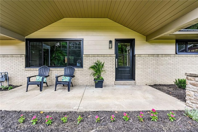 5 Bel Aire Dr, Murrysville, PA 15626 - doorway to property featuring brick siding and a patio