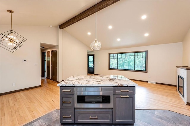 5 Bel Aire Dr, Murrysville, PA 15626 - kitchen featuring light wood-style floors, a chandelier, light stone counters, and decorative light fixtures