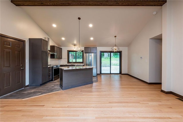 5 Bel Aire Dr, Murrysville, PA 15626 - kitchen featuring stainless steel appliances, wall chimney exhaust hood, light wood-type flooring, decorative backsplash, and recessed lighting