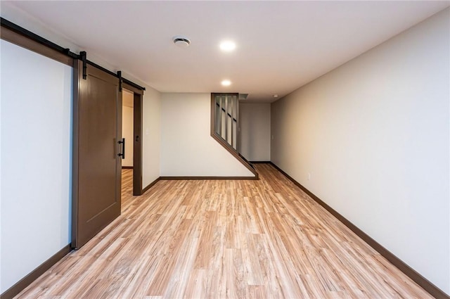 5 Bel Aire Dr, Murrysville, PA 15626 - unfurnished room featuring a barn door, light wood finished floors, stairway, and recessed lighting
