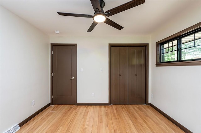 5 Bel Aire Dr, Murrysville, PA 15626 - unfurnished bedroom with light wood finished floors, a closet, and a ceiling fan