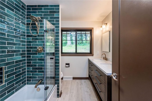 5 Bel Aire Dr, Murrysville, PA 15626 - full bathroom featuring double vanity, shower / bathtub combination, and wood finished floors