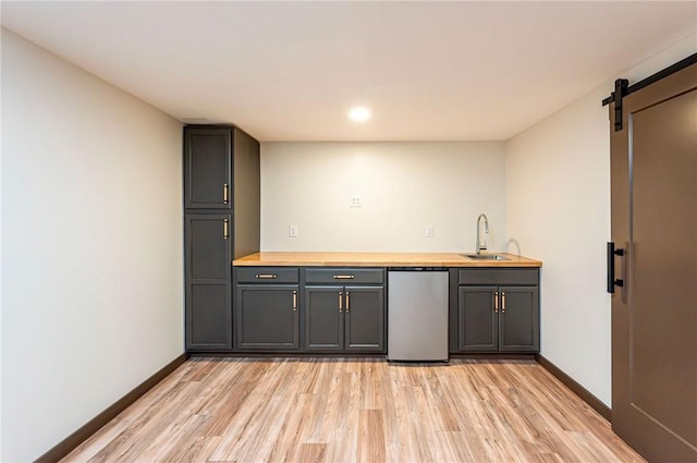 5 Bel Aire Dr, Murrysville, PA 15626 - bar featuring a barn door, light wood-style flooring, and recessed lighting