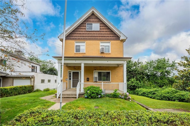 1810 Fairland St, Carrick, PA 15210 - view of front of house featuring brick siding, covered porch, and a front yard