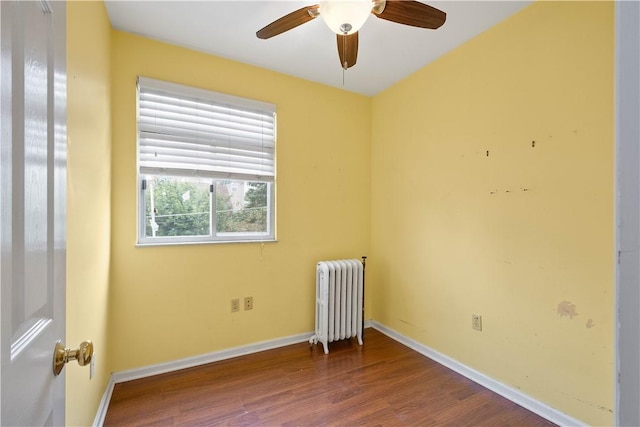 1810 Fairland St, Carrick, PA 15210 - unfurnished room featuring radiator, wood finished floors, and a ceiling fan
