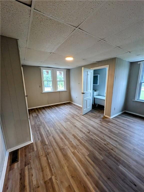 1837 Beech St, Mckeesport, PA 15132 - unfurnished bedroom with wood finished floors and a paneled ceiling