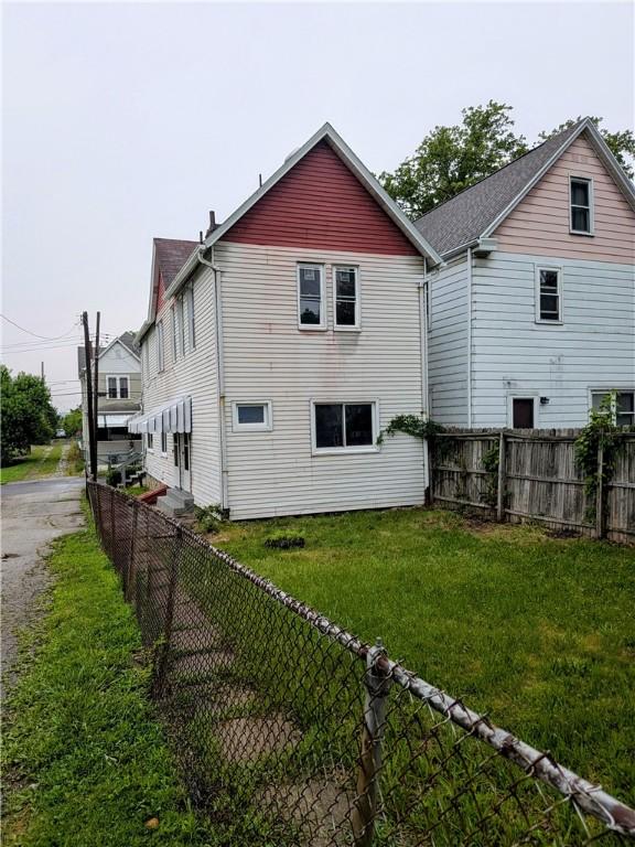 1837 Beech St, Mckeesport, PA 15132 - rear view of house with asphalt driveway