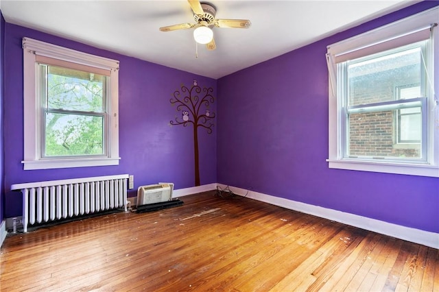3001 Mount Allister Rd, Observatory Hill, PA 15214 - spare room with radiator, hardwood / wood-style flooring, and ceiling fan