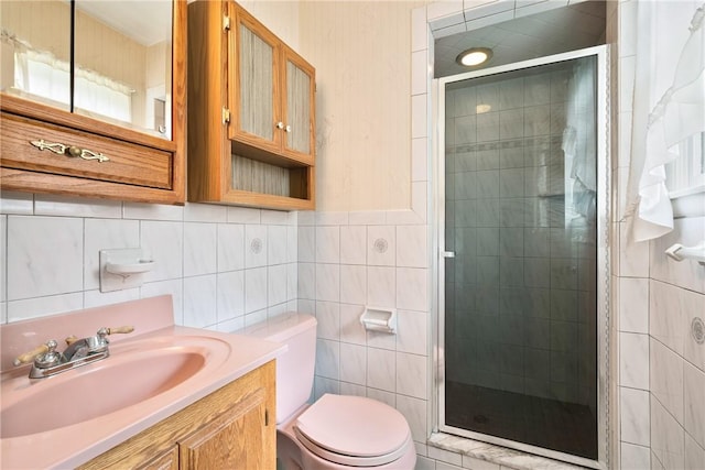 315 Olive St, Mccandless, PA 15237 - bathroom featuring a shower stall, vanity, and tile walls