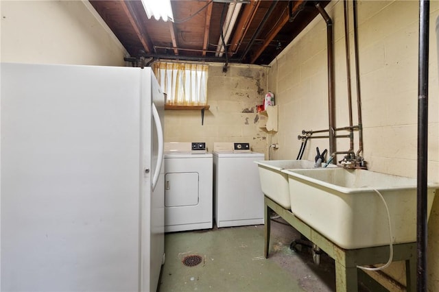 315 Olive St, Mccandless, PA 15237 - washroom with concrete block wall and washing machine and dryer