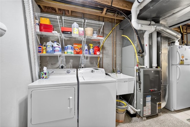 1049 Waterford Ct E, North Strabane, PA 15317 - laundry room with separate washer and dryer and heating unit