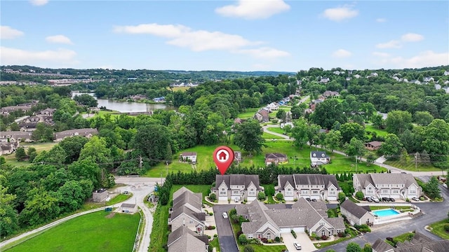 1049 Waterford Ct E, North Strabane, PA 15317 - aerial perspective of suburban area with a large body of water and a tree filled landscape