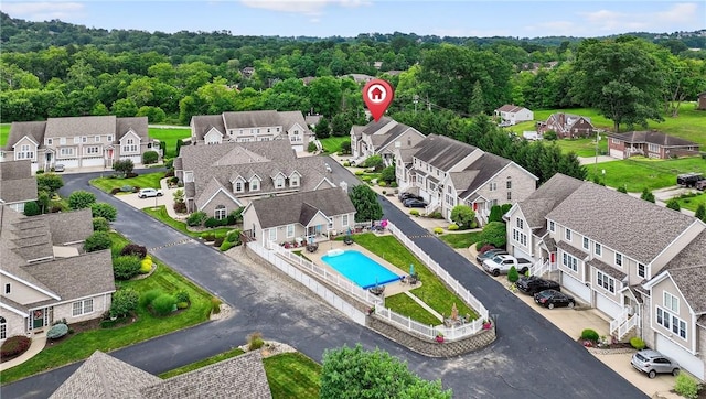 1049 Waterford Ct E, North Strabane, PA 15317 - aerial perspective of suburban area with a pool