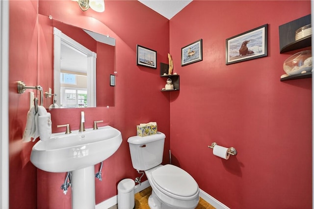 1049 Waterford Ct E, North Strabane, PA 15317 - half bath featuring toilet and wood finished floors