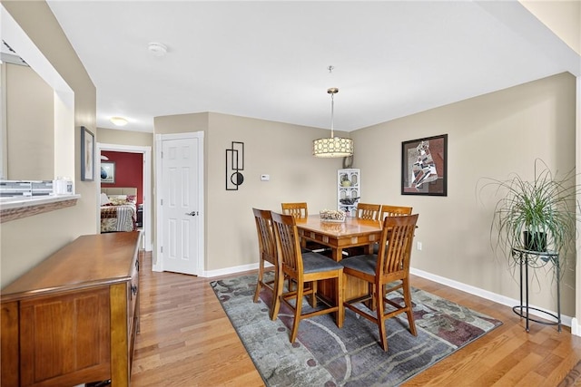 1049 Waterford Ct E, North Strabane, PA 15317 - dining space featuring light wood-type flooring and baseboards