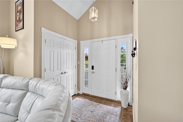 1049 Waterford Ct E, North Strabane, PA 15317 - tiled foyer featuring high vaulted ceiling and baseboards