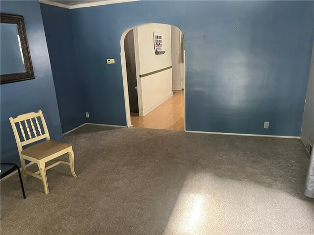 121 W Midland Ave, Midland Boro, PA 15059 - carpeted empty room with arched walkways and baseboards