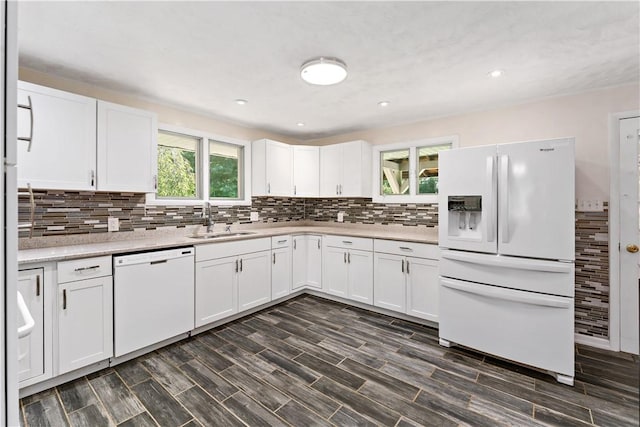 5342 Pleasant Unity Rd, Latrobe, PA 15650 - kitchen featuring white appliances, light countertops, backsplash, white cabinetry, and dark wood-style flooring