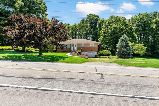 5342 Pleasant Unity Rd, Latrobe, PA 15650 - view of front facade with a front yard, driveway, and view of scattered trees