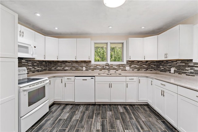 5342 Pleasant Unity Rd, Latrobe, PA 15650 - kitchen featuring white appliances, white cabinetry, decorative backsplash, and recessed lighting