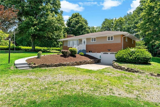 5342 Pleasant Unity Rd, Latrobe, PA 15650 - ranch-style house featuring an attached garage, brick siding, driveway, and a front yard