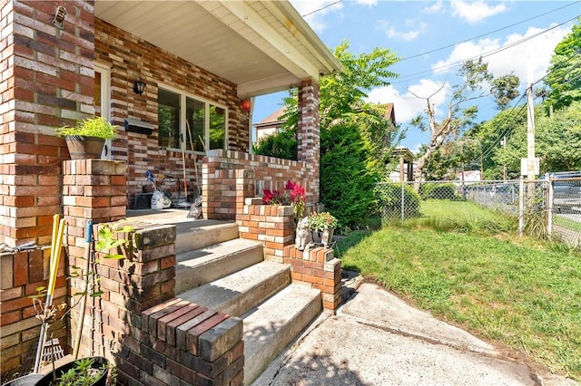 53 Fountain St, Crafton, PA 15205 - view of exterior entry featuring covered porch and brick siding