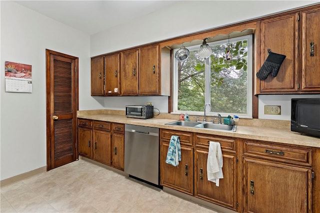 53 Fountain St, Crafton, PA 15205 - kitchen with appliances with stainless steel finishes, light countertops, and brown cabinets
