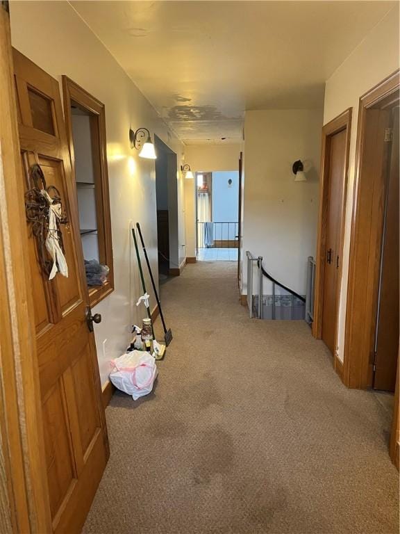 214 E Fairview Ave, Connellsville, PA 15425 - hall with carpet floors, an upstairs landing, and radiator