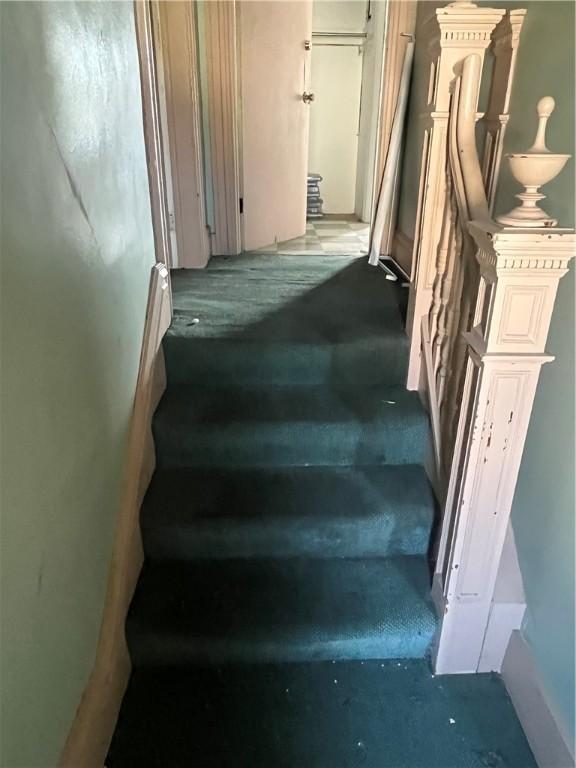 214 E Fairview Ave, Connellsville, PA 15425 - stairs featuring carpet flooring