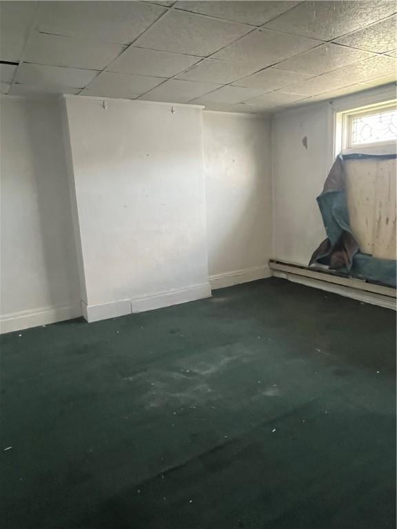 214 E Fairview Ave, Connellsville, PA 15425 - unfurnished room featuring unfinished concrete flooring and a paneled ceiling