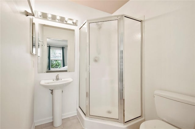 301 N Winebiddle St, Garfield, PA 15224 - bathroom with a stall shower and toilet