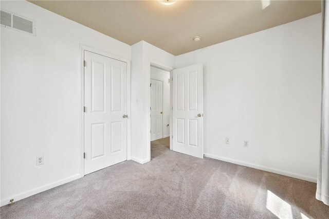 301 N Winebiddle St, Garfield, PA 15224 - unfurnished bedroom featuring carpet and baseboards
