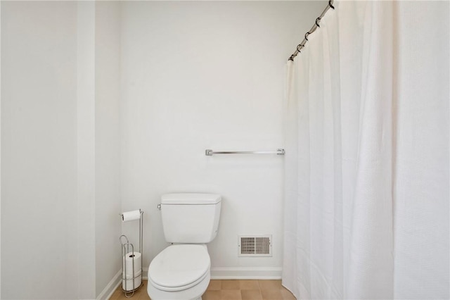 301 N Winebiddle St, Garfield, PA 15224 - bathroom with toilet and a shower with curtain