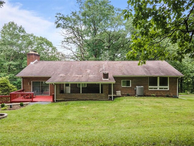 1082 N Boundary, Cranberry Twp, PA 16066 - back of house with a chimney, a wooden deck, a lawn, and brick siding