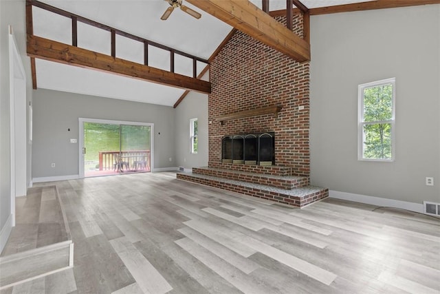 1082 N Boundary, Cranberry Twp, PA 16066 - unfurnished living room with high vaulted ceiling, ceiling fan, plenty of natural light, beamed ceiling, and wood finished floors