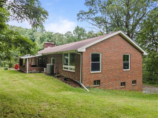 1082 N Boundary, Cranberry Twp, PA 16066 - back of property featuring brick siding, a lawn, and a chimney