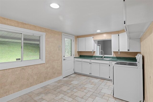 1082 N Boundary, Cranberry Twp, PA 16066 - kitchen featuring stove, dark countertops, white cabinetry, and recessed lighting