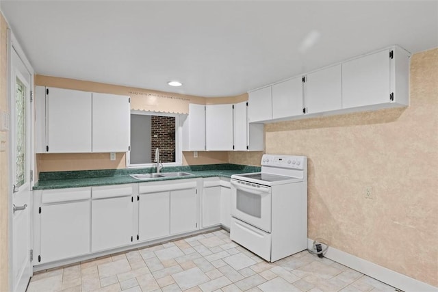 1082 N Boundary, Cranberry Twp, PA 16066 - kitchen featuring white range with electric cooktop, dark countertops, white cabinetry, and recessed lighting