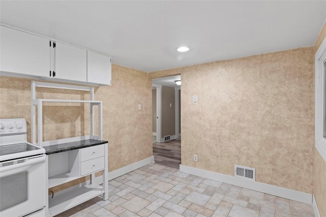 1082 N Boundary, Cranberry Twp, PA 16066 - kitchen with white electric range, white cabinets, and recessed lighting