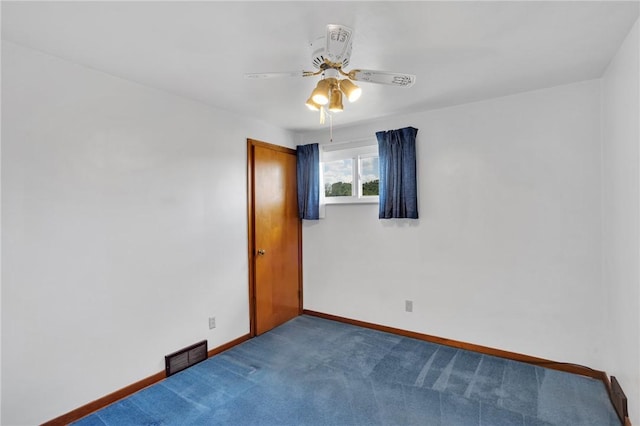 1919 Outlook Dr, Penn Hills, PA 15147 - spare room with a ceiling fan and dark colored carpet