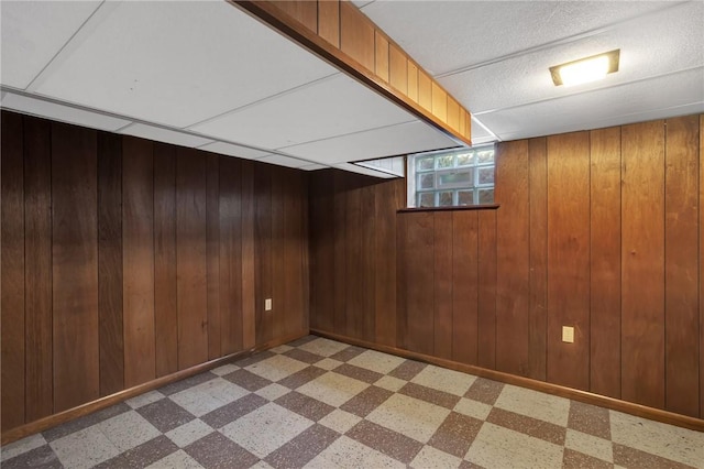 1919 Outlook Dr, Penn Hills, PA 15147 - basement with tile patterned floors and wooden walls