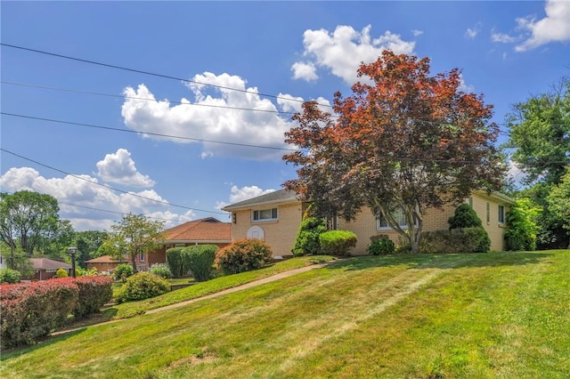 1919 Outlook Dr, Penn Hills, PA 15147 - view of front of property with a front lawn and brick siding