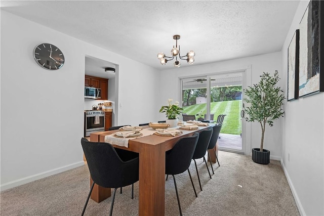 1214 Regency Dr, Mccandless, PA 15237 - dining room featuring a chandelier, light colored carpet, and a textured ceiling
