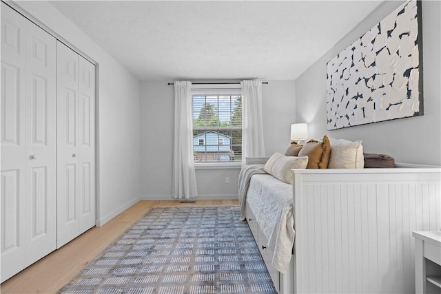 1214 Regency Dr, Mccandless, PA 15237 - bedroom featuring light wood-type flooring and a closet
