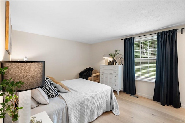 1214 Regency Dr, Mccandless, PA 15237 - bedroom with light wood finished floors and baseboards