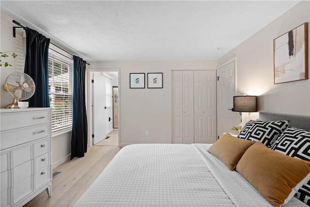 1214 Regency Dr, Mccandless, PA 15237 - bedroom with light wood-type flooring and a closet