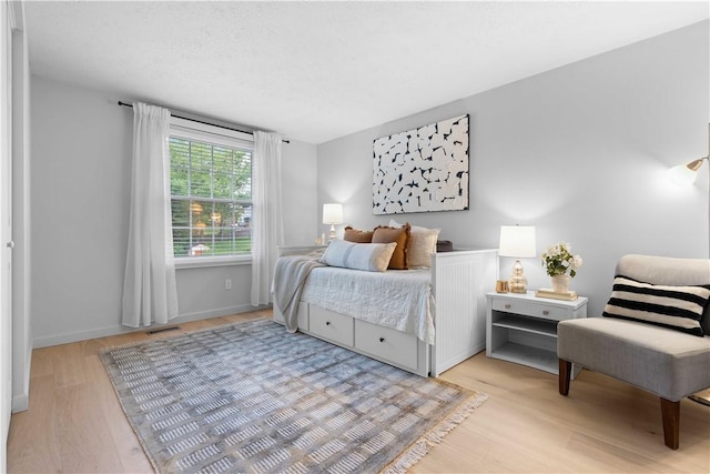 1214 Regency Dr, Mccandless, PA 15237 - bedroom featuring light wood-type flooring and baseboards