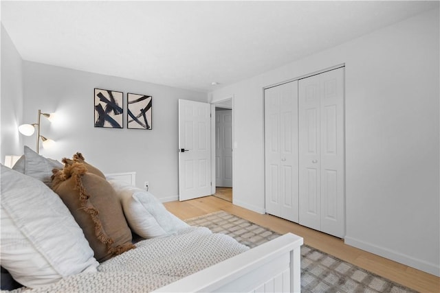 1214 Regency Dr, Mccandless, PA 15237 - bedroom with light wood-style flooring and a closet